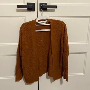 Woman’s Pink Rose burnt orange sweater